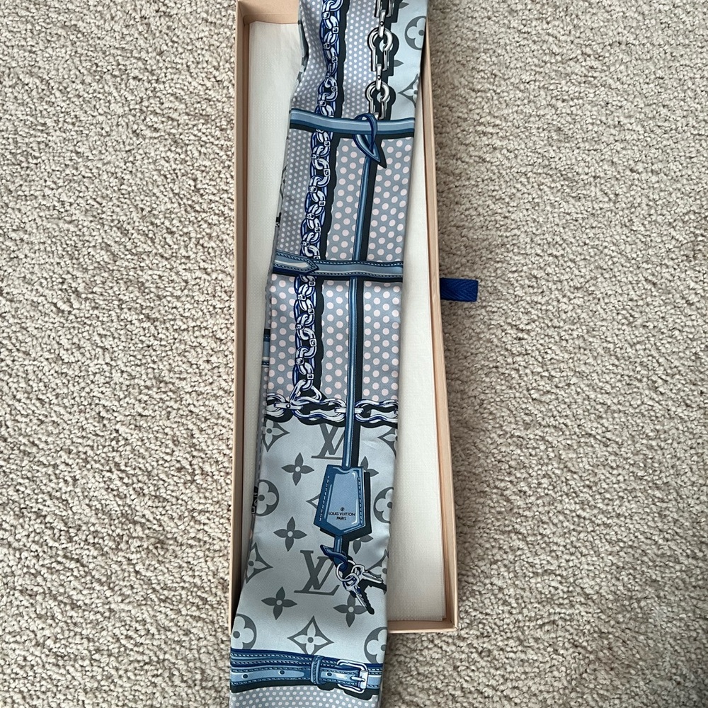 Authentic Louis Vuitton blue, gray and pink scarf. Box not included.
